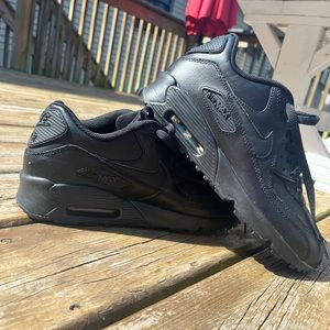 All black Nike air max shoes